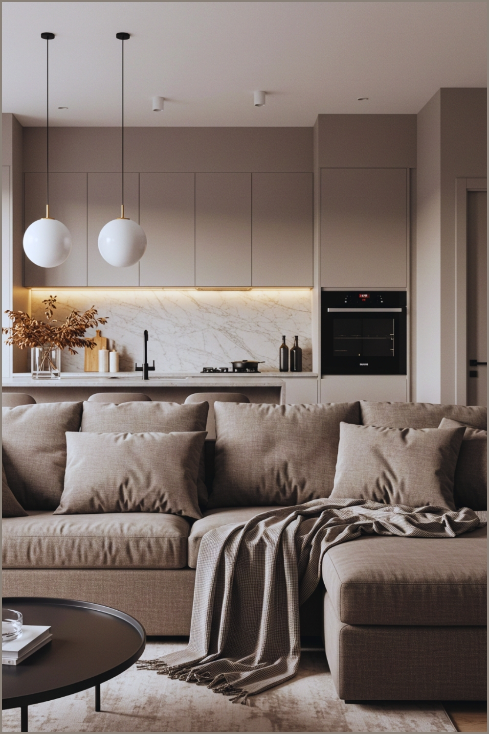 A Sleek Minimalist Living Room With Taupe Sectional Sofa, Oversized Pillows