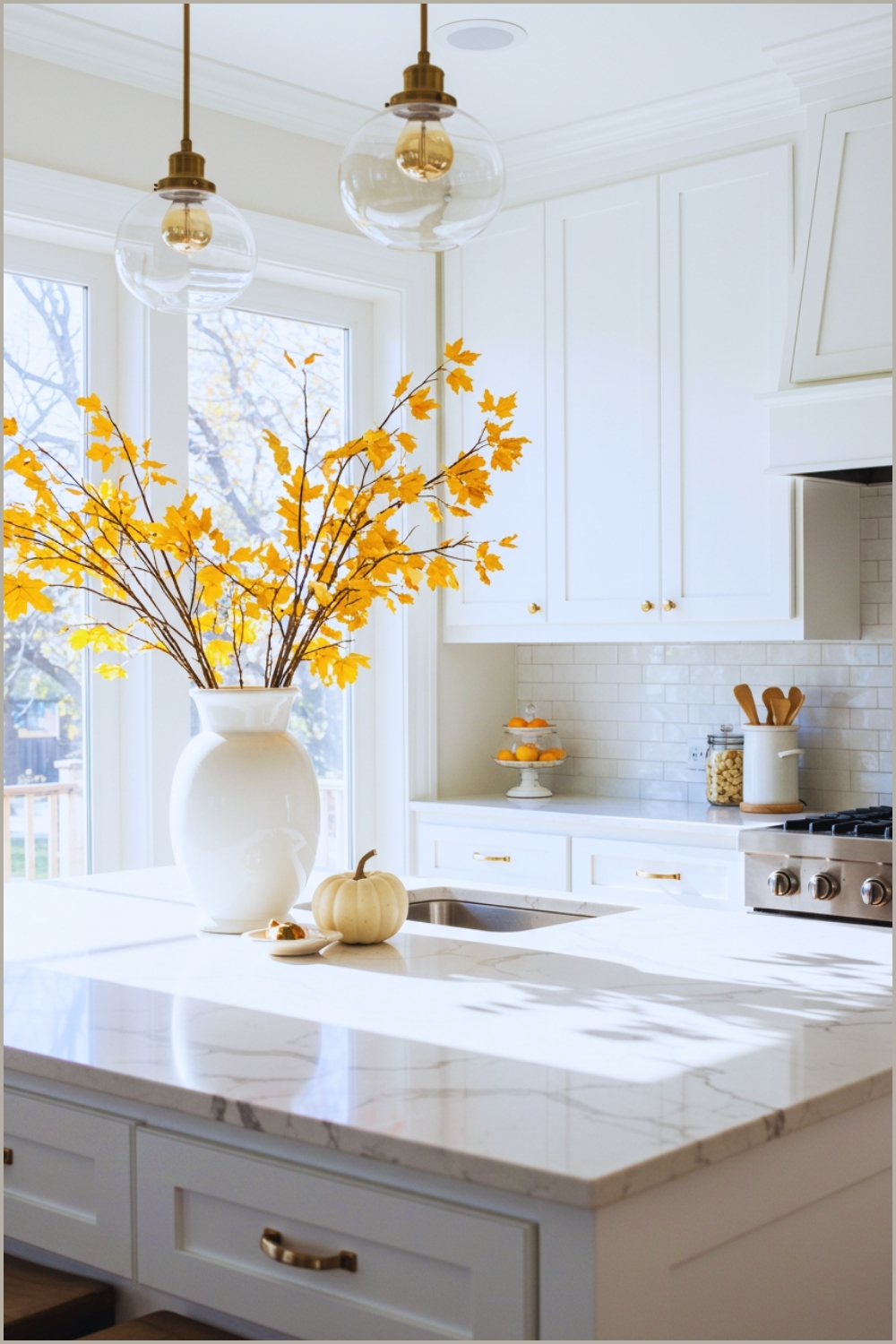 Bright Modern Kitchen With White Marble Countertops And White Cabinets