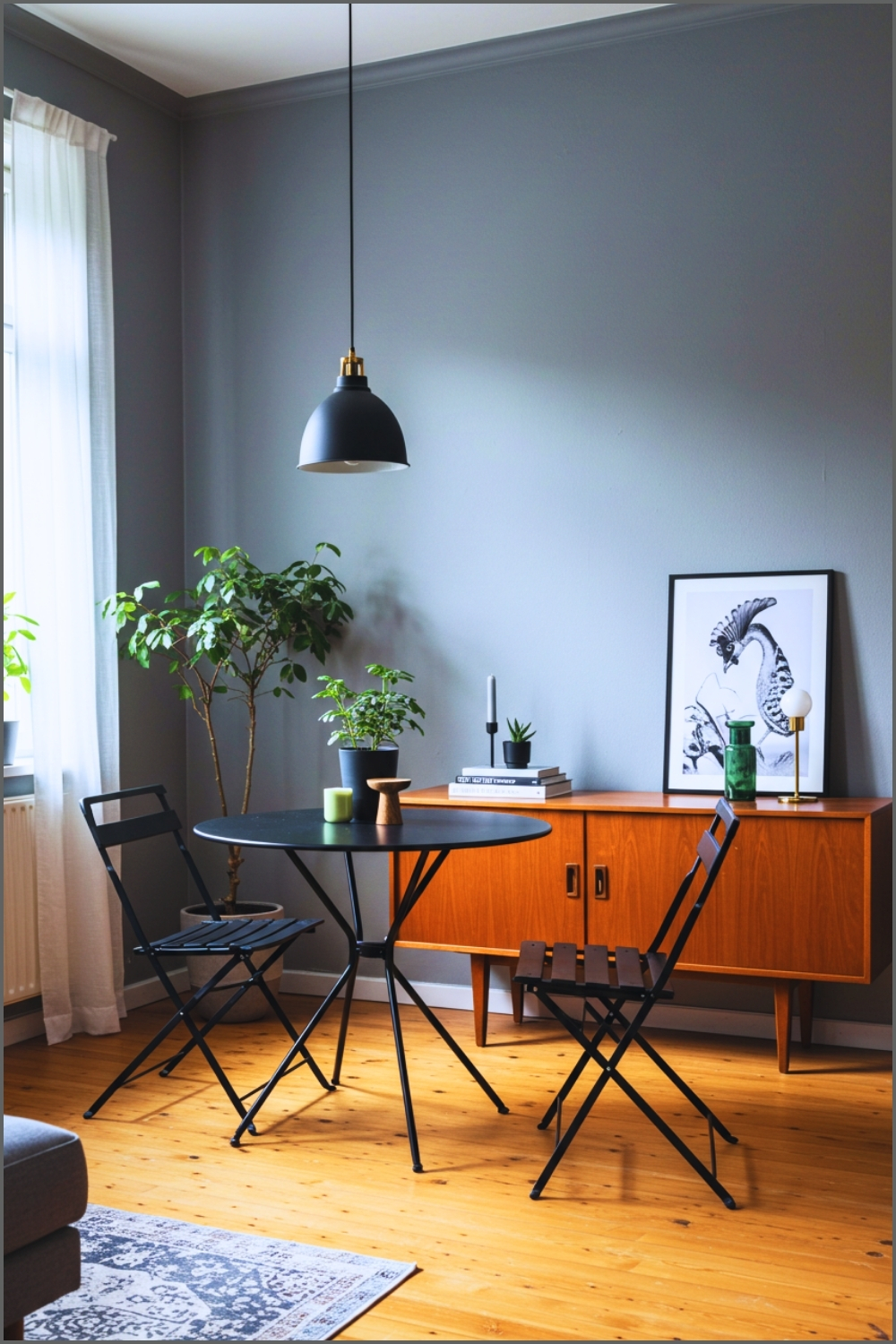 Compact Modern Living Room With Small Black Metal Round Dining Table