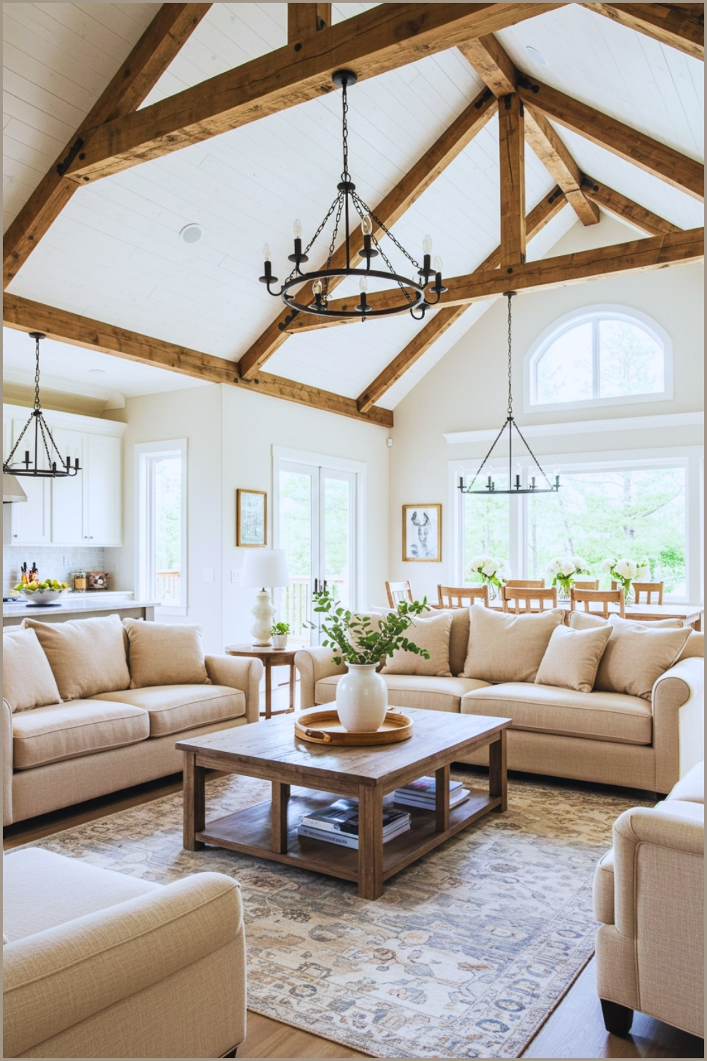 Open Concept Living Room With Vaulted Wooden Truss Ceiling