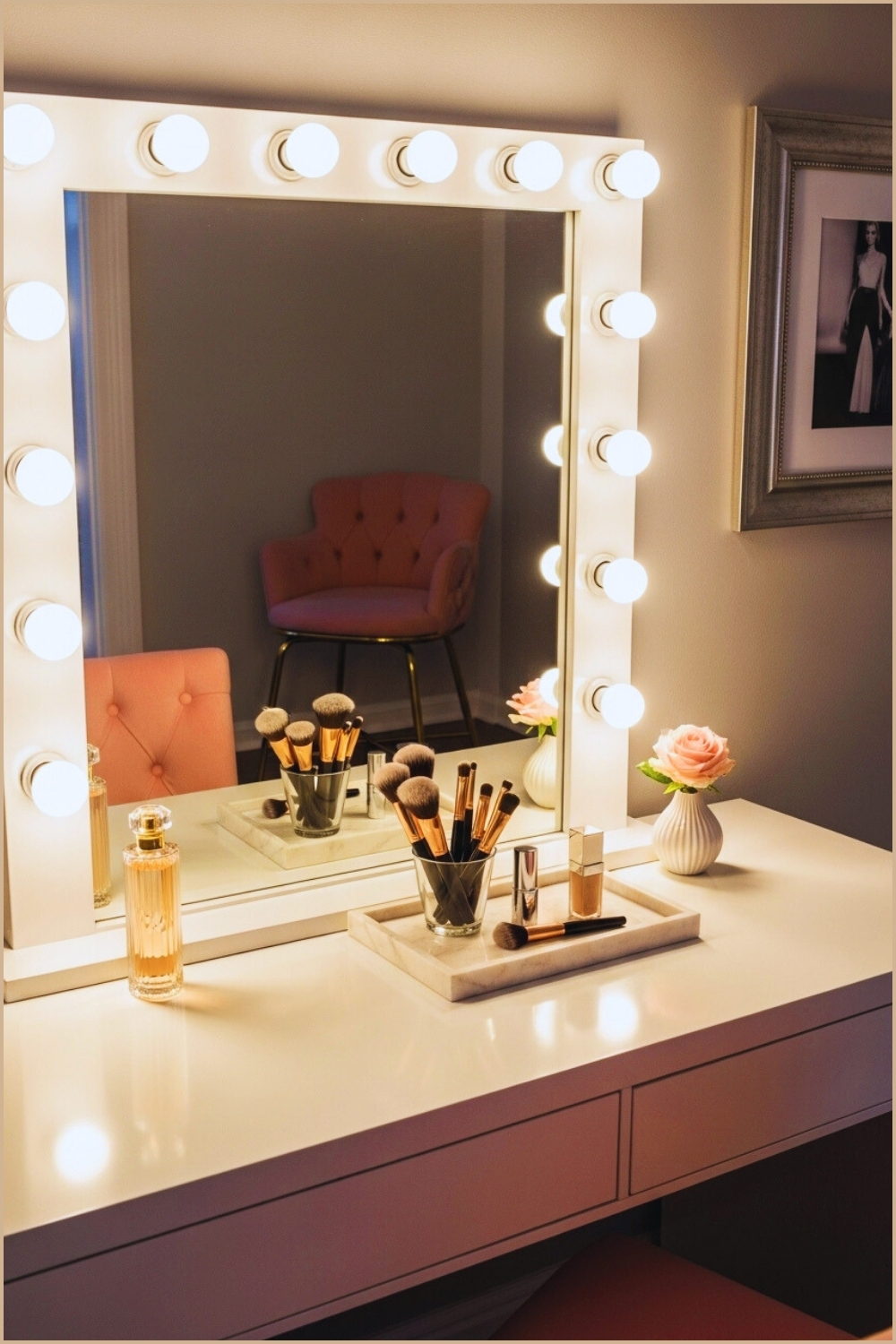 A Chic Hollywood Style Vanity With A Glowing Mirror Framed By Bright Bulbs