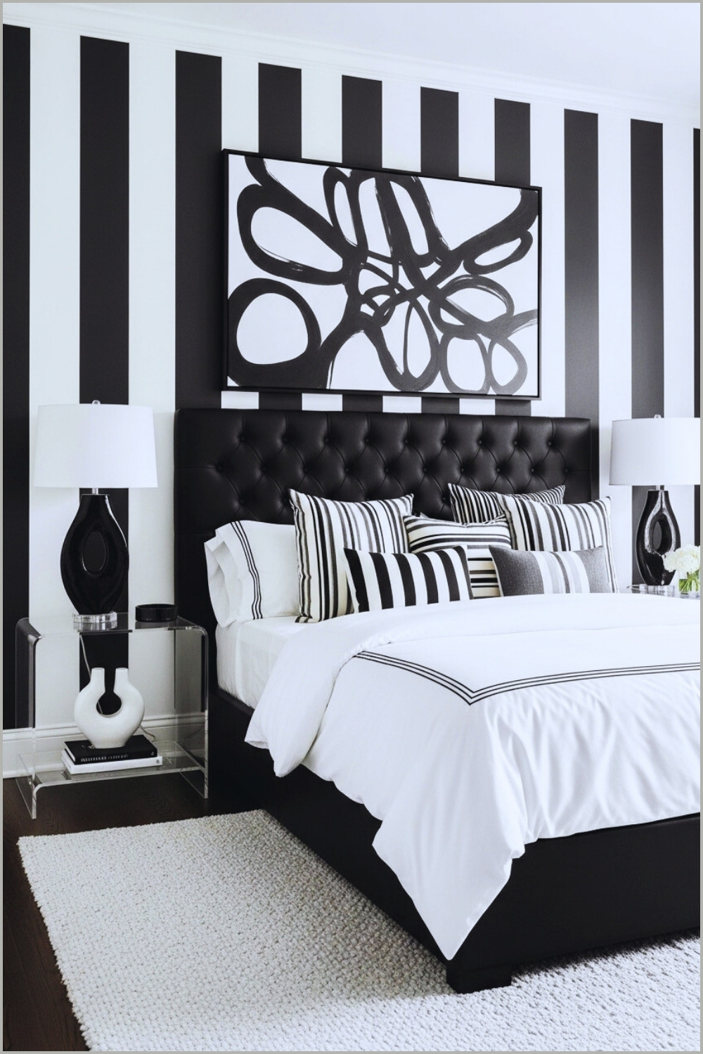 A Modern Black And White Bedroom With Bold Vertical Striped Wallpaper