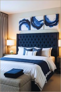 Modern Elegant Bedroom With Navy Blue Upholstered Headboard
