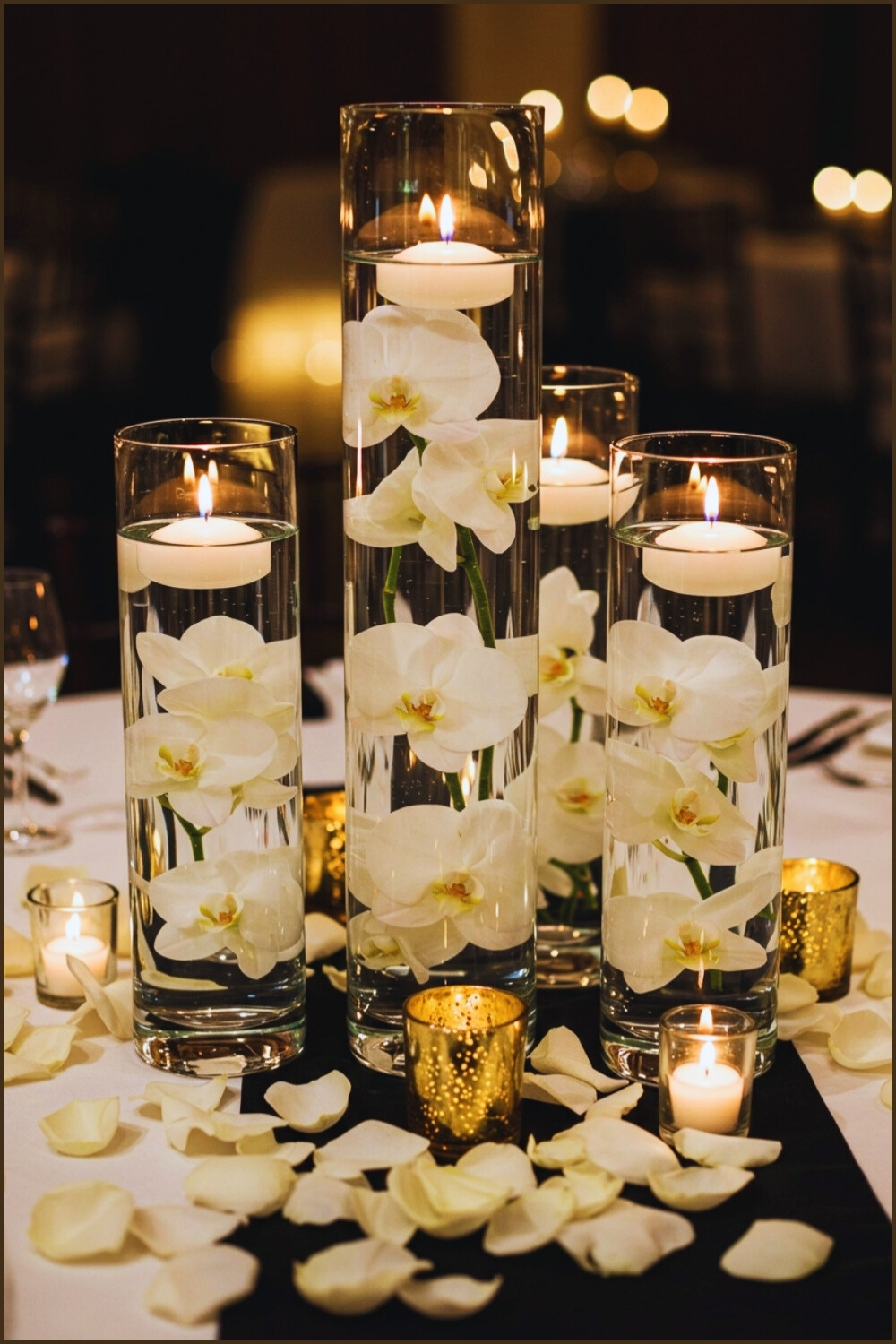 Romantic Table Setting Tall Glass Vases Filled Water