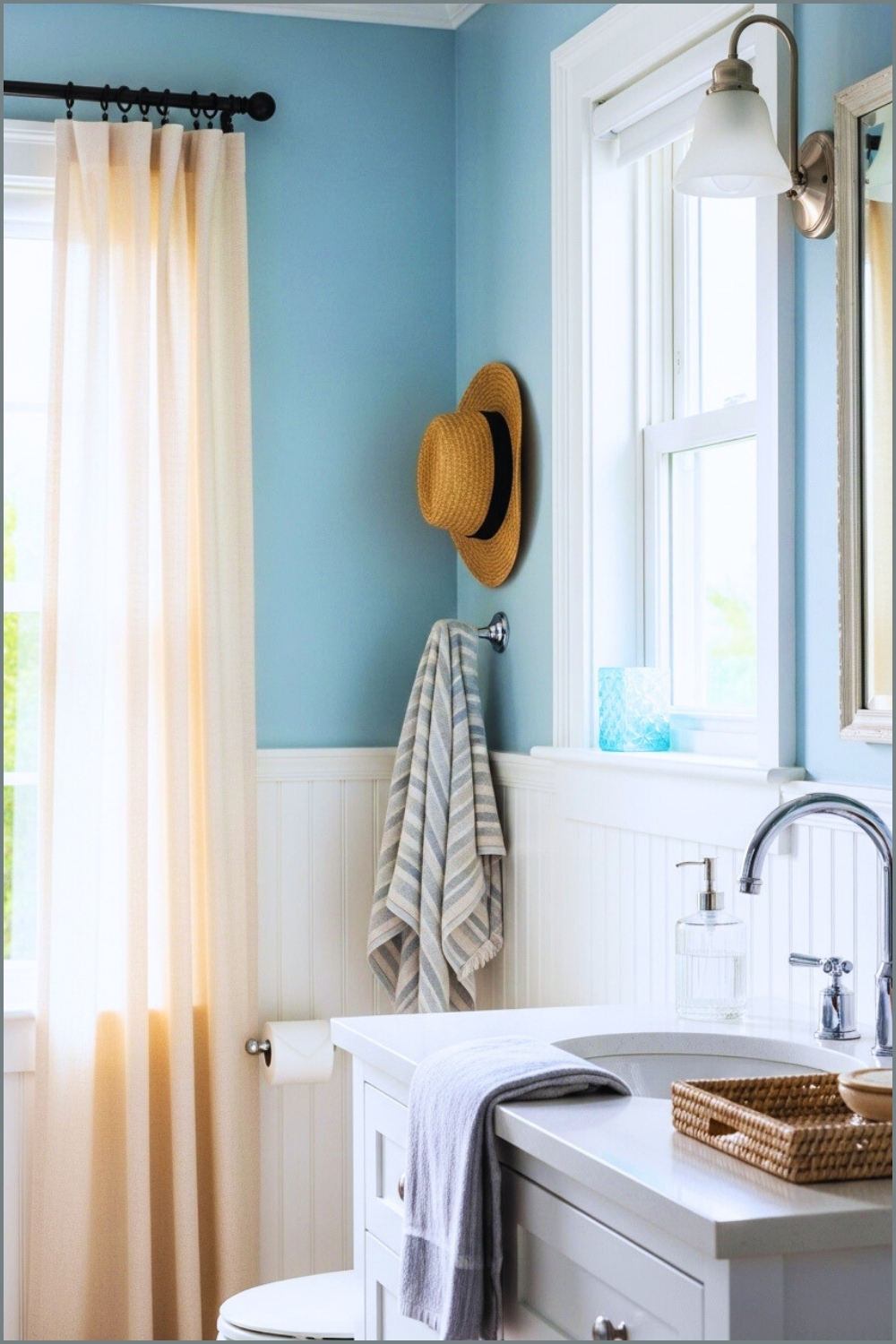 Bright Coastal Style Bathroom With Soothing Soft Blue Walls