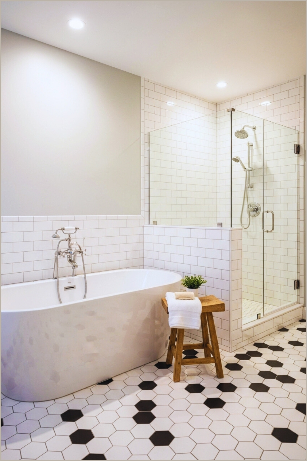 Bright Minimalist Bathroom With White Bathtub And Shower