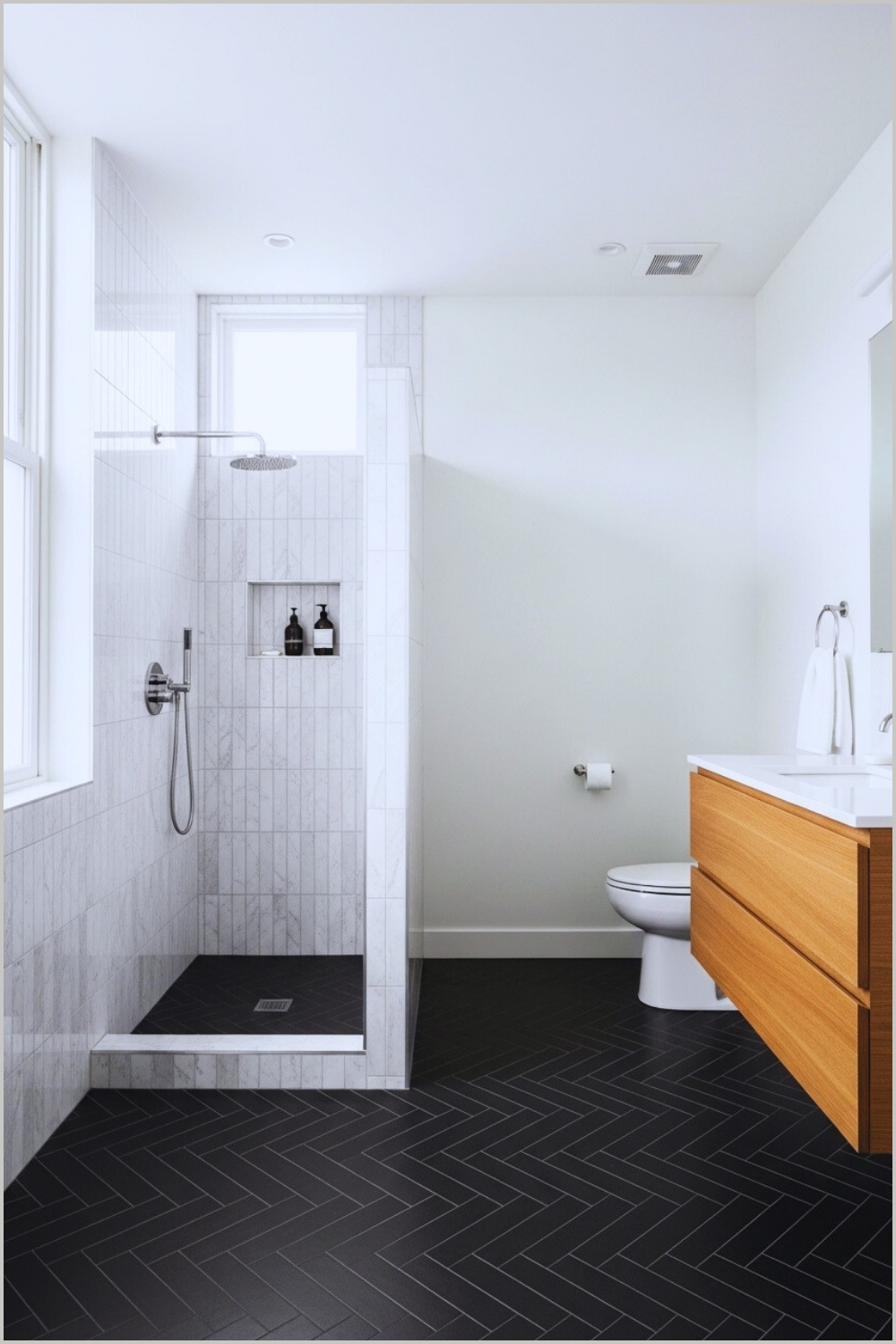 Minimalist Modern Bathroom With Black Herringbone Tile Floor