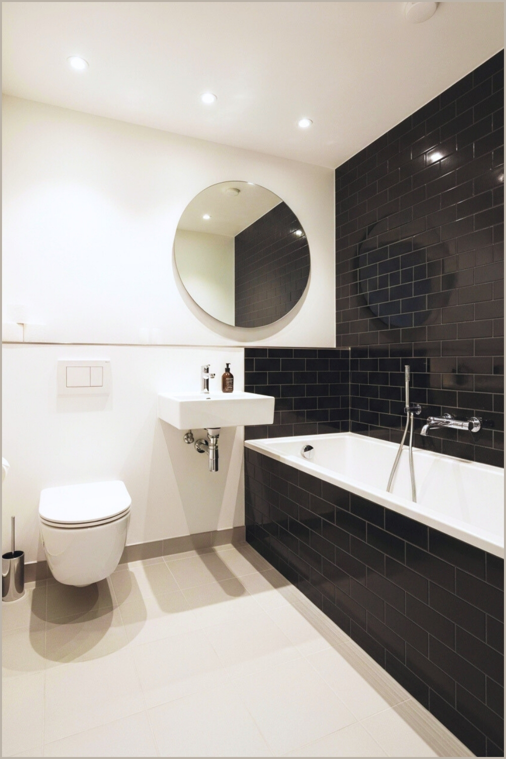 Modern Minimalist Bathroom With White Bathtub And Compact Toilet