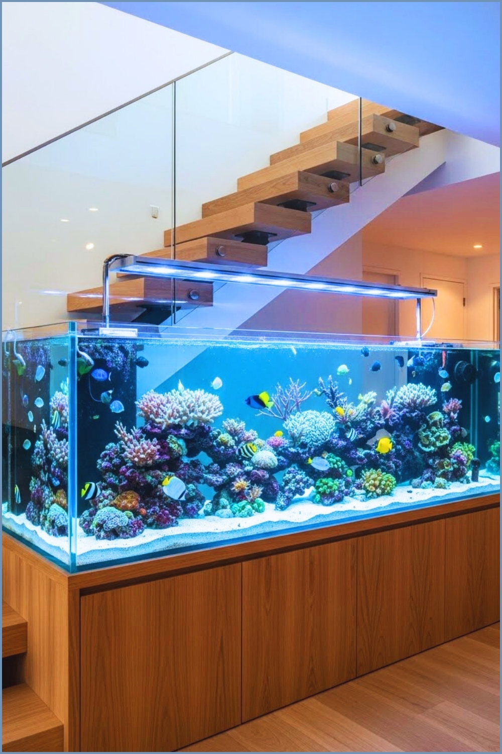 A Dramatic Under Stairs Built In Aquarium Seamlessly