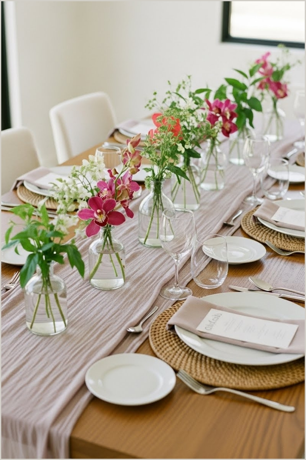 A Long Wooden Dining Table Elegantly Set For A Formal Gathering