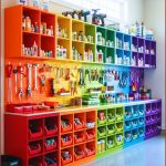 A Vibrant Garage Storage Wall With Colorful Cubby Shelves