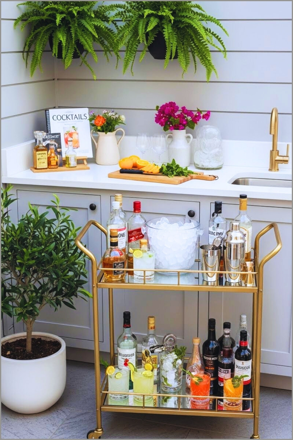 Chic Outdoor Bar Corner With Gold Bar Cart Filled