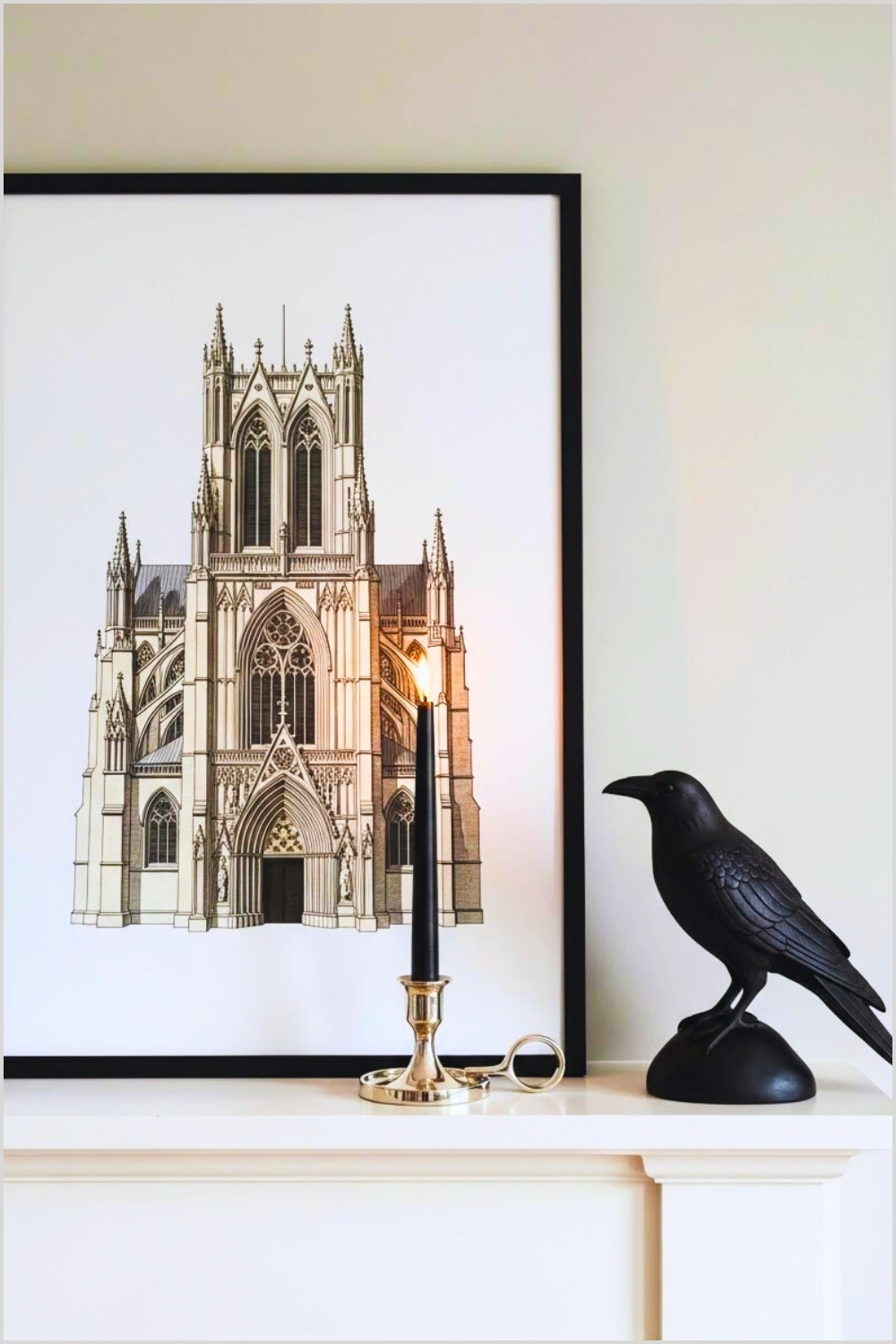 Dark Academia Mantel Decor Featuring A Large Black Framed