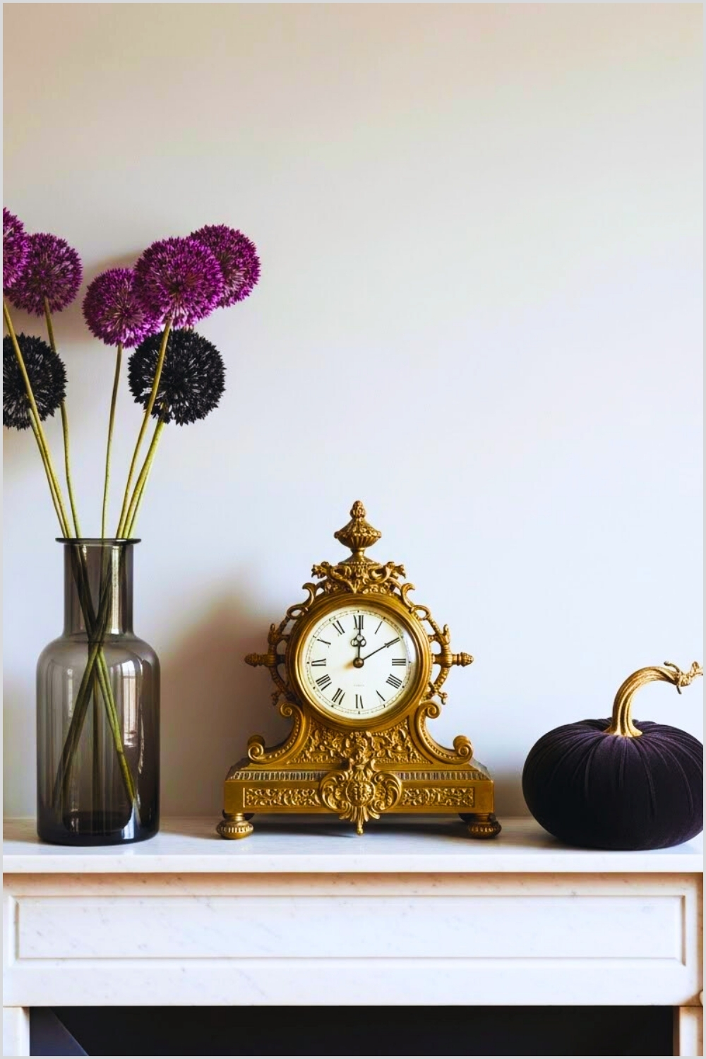 Elegant Vintage Mantel Decor Featuring An Ornate Antique Brass