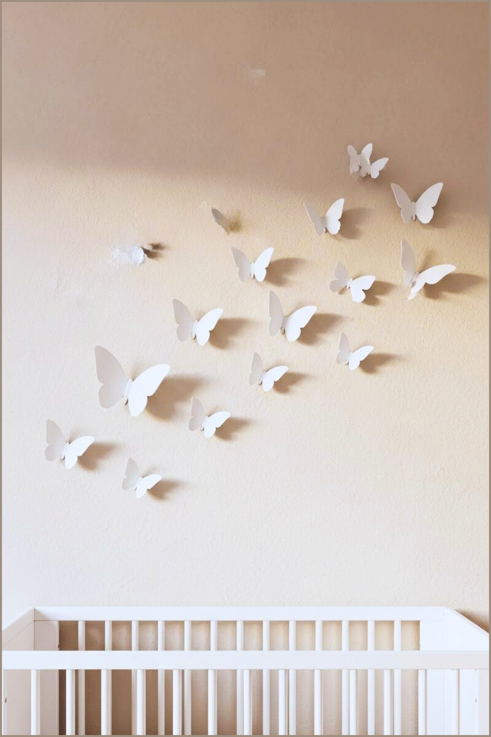 Minimalist Butterfly Nursery Wall With Elegant White