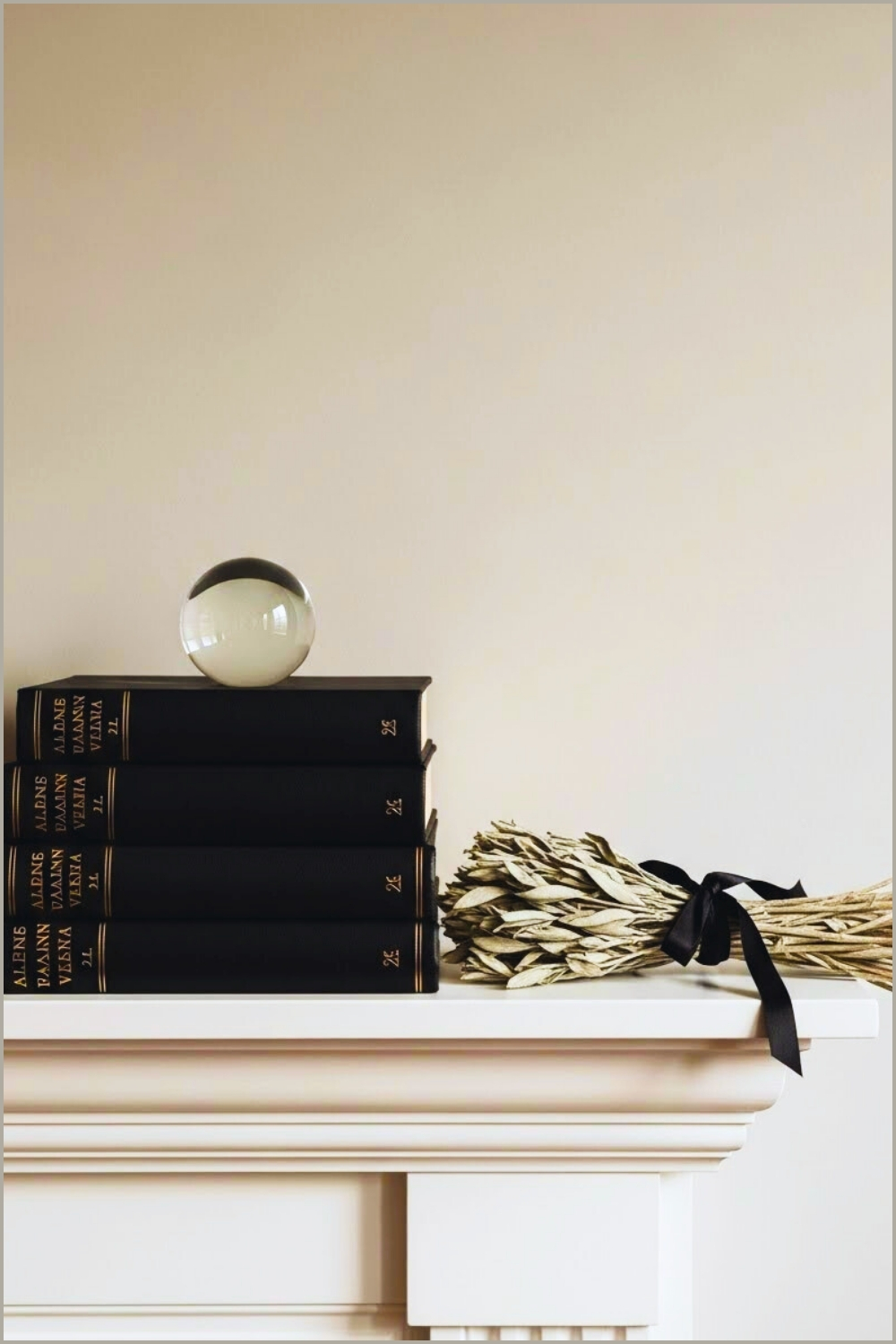 Minimalist Dark Academia Mantel Decor Featuring A Stack