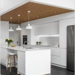 Modern Minimalist Kitchen With A High Ceiling And A Recessed