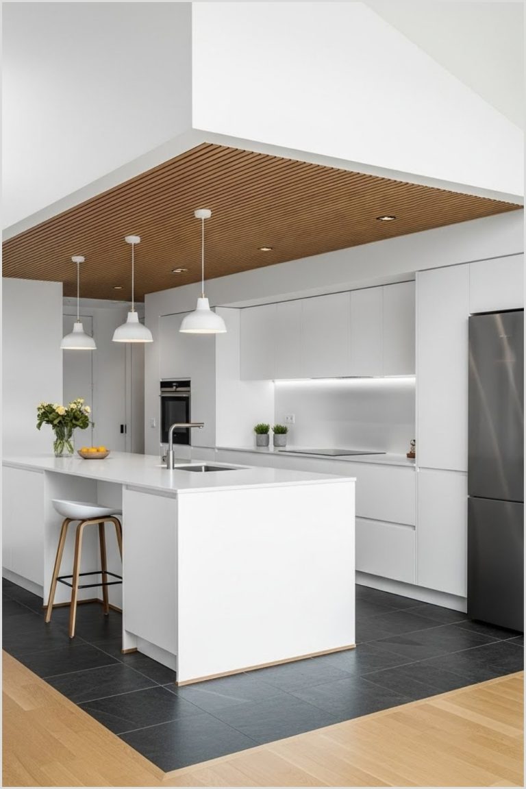Modern Minimalist Kitchen With A High Ceiling And A Recessed