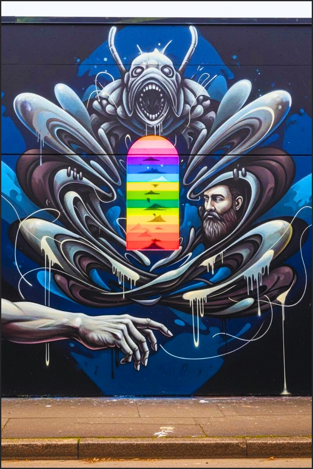 Storytelling Street Art Wall Mural Painted On A Concrete Brick Wall