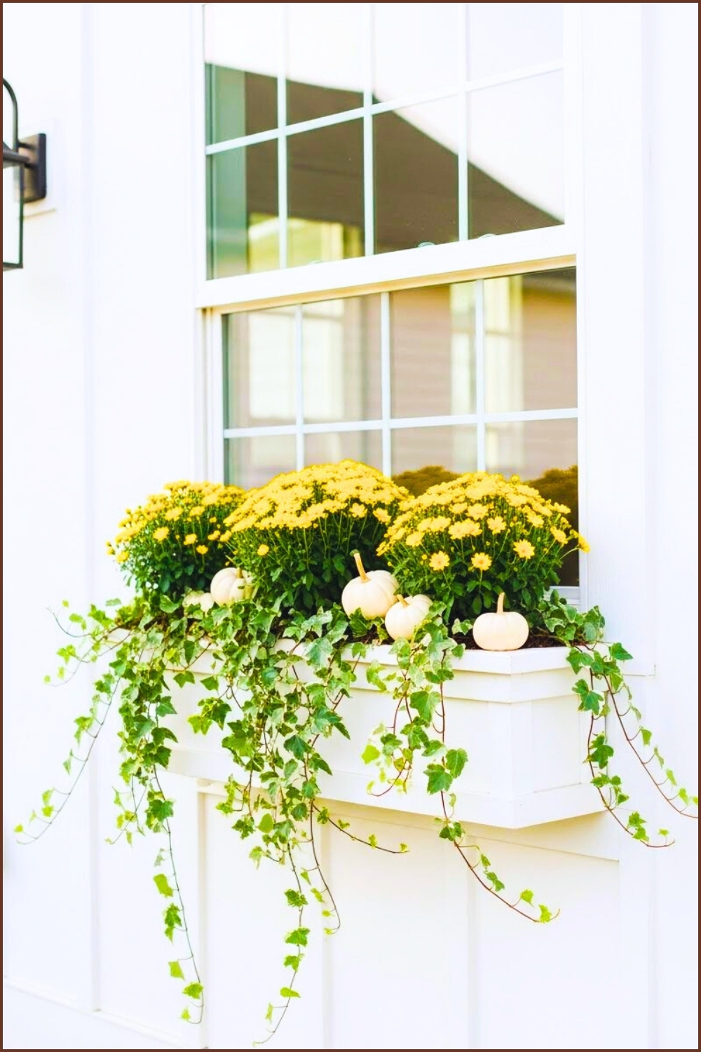 White Modern Farmhouse Window With Fall Planter